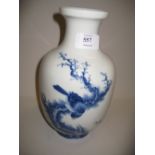 20th Century Chinese blue and white baluster form vase depicting a bird on a branch having six