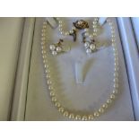 Pair of rolled gold and cultured pearl earrings and a simulated pearl necklace
