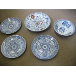 20th Century Chinese blue, white and coloured floral decorated dish having concentric rings and six