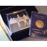 9ct Gold Queen Elizabeth II commemorative coin in case together with a similar silver medallion