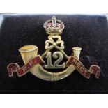 14ct Gold and enamel F.F. Regiment brooch in original case