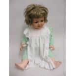 Mid 20th Century celluloid headed doll with jointed composition body, the head marked K. and R.