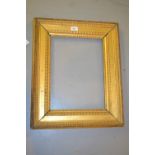 19th Century gilt picture frame having ripple decoration, aperture size 16ins x 12ins