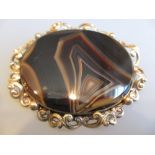 Victorian oval gilt metal mounted agate brooch