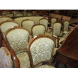 Harlequin set of nine elbow and standard chairs