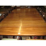 19th Century mahogany drop-leaf dining table with concertina action and two extra leaves extending