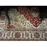 Modern red ground Kum pattern machine made carpet, 2.8m x 2m