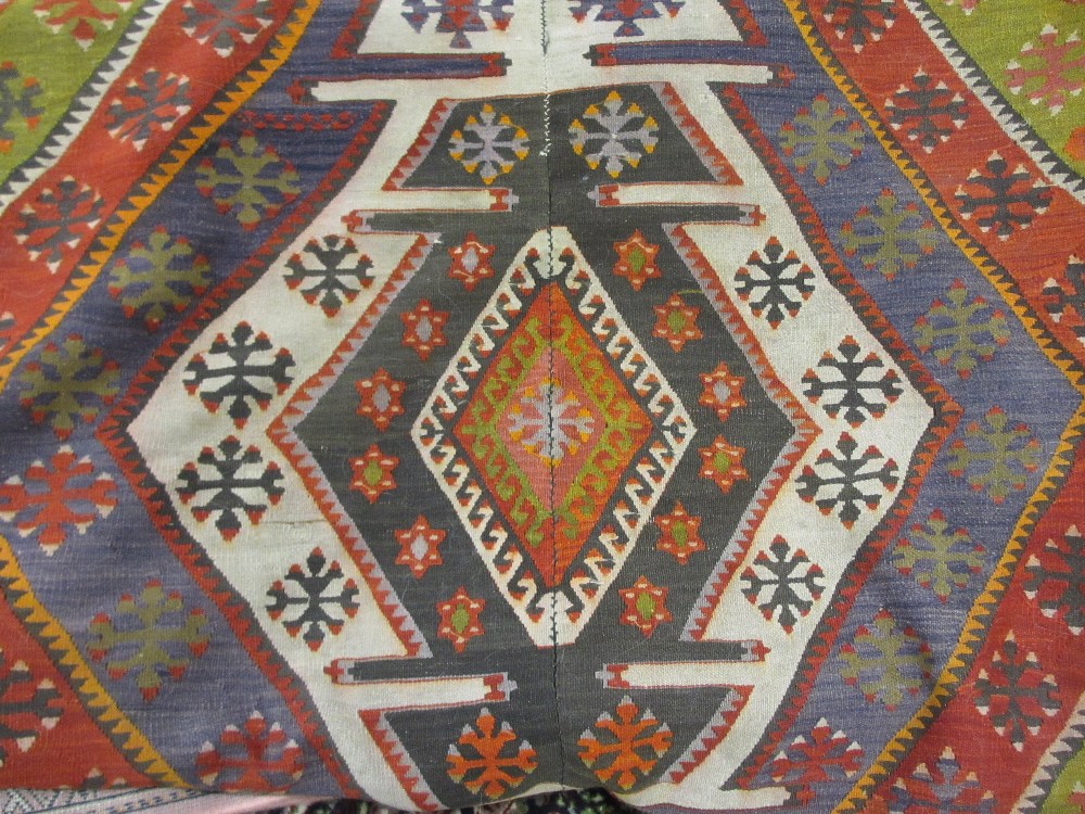 Large Kelim flat weave rug of geometric design, approximately 12ft x 5ft