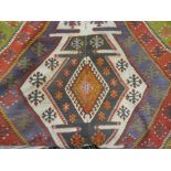 Large Kelim flat weave rug of geometric design, approximately 12ft x 5ft