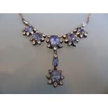 15ct Gold pendant necklace set with white and blue sapphires