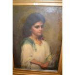 Late 19th / early 20th Century oil on canvas, half length portrait of a girl wearing a white gown,