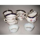 Quantity of Coalport tea ware painted with roses within cobalt blue and gilt borders, together with
