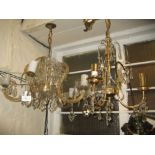 Glass five branch chandelier together with a modern brass and glass chandelier