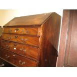 George III mahogany bureau, the fall front enclosing a fitted interior over four graduated drawers