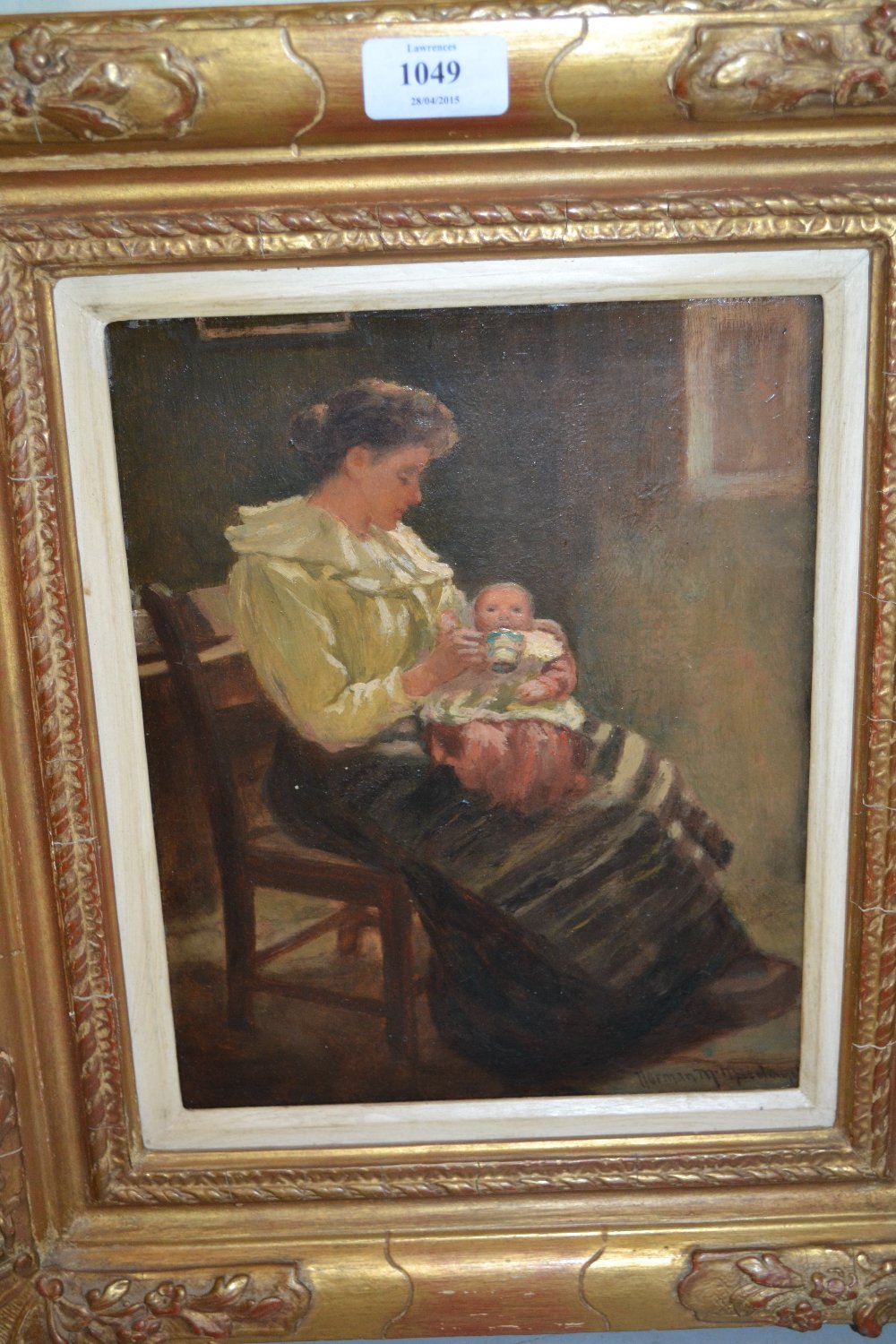 Norman M. MacDougal, oil on board, a mother seated nursing a baby in an interior, signed, 10.5ins x