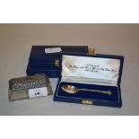 Small cut glass silver mounted dressing table bottle and three cased silver commemorative spoons