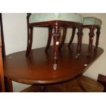 Reproduction mahogany dining room suite comprising: bow front sideboard, D-end table and six chairs