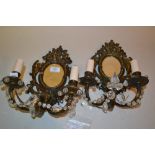 Pair of 19th Century embossed brass and mirror backed twin light wall sconces with glass mounts and