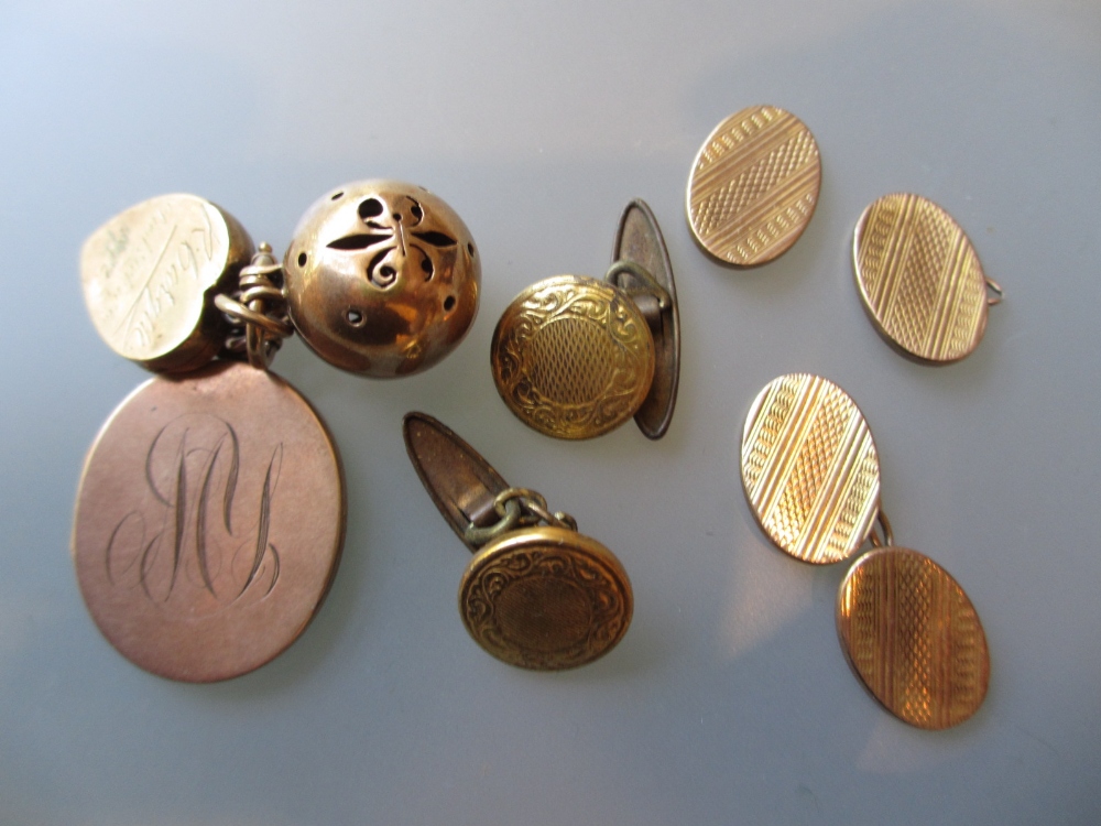 Two 9ct gold lockets, similar ball form charm, pair of cufflinks (a/f) and a pair of gold plated