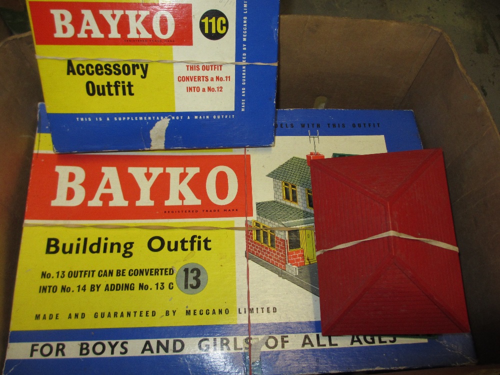 Box containing various childrens building sets including Bayko and two sets of mini bricks