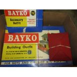 Box containing various childrens building sets including Bayko and two sets of mini bricks