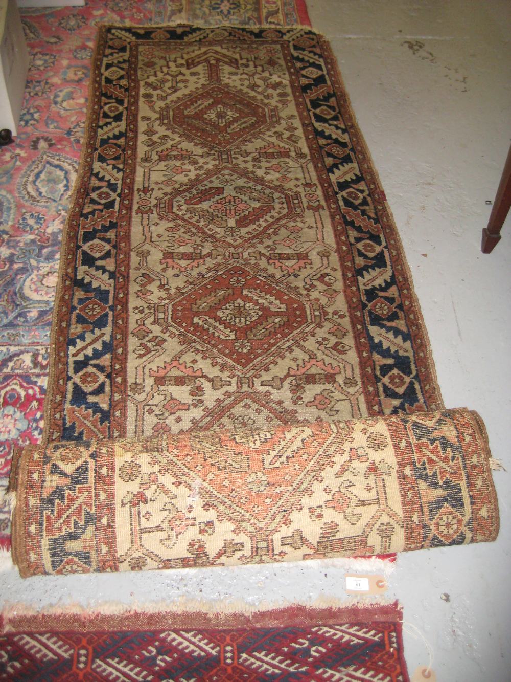 Hamadan runner with repeating pole medallion design on a fawn ground with borders, 14ft x 2ft 6ins