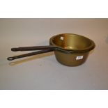 Set of three brass and iron handled saucepans