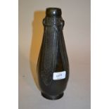 Chinese dark patinated bronze bottle vase with shallow relief decoration, 10.25ins high