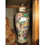 19th Century Chinese crackleware baluster form vase and cover decorated with a battle scene