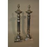 Pair of silver plated table lamp bases with fluted columns and square bases