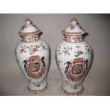 Pair of Samson Chinese export vases with covers (covers a/f)