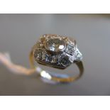 Art Deco style diamond set ring with centre stone in a square surround (approximately 0.7ct total)
