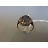 18ct Yellow gold circular sapphire and diamond cluster ring