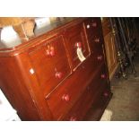 Victorian mahogany chest of four small and three long drawers with knob handles