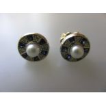 Pair of diamond, sapphire and pearl set ear studs in fitted box