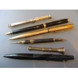 9ct Gold cigar piercer, silver double ended pen / propelling pencil and four various pens and