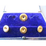 Cased set of four 9ct gold dress studs