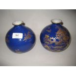 Pair of 1930's Wilton ware squat baluster form vases with gilded chinoiserie decoration on a blue