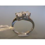 18ct White gold two stone diamond crossover ring, approximately 1.03ct