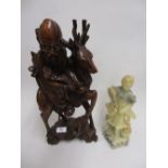 Chinese carved hardwood figure of a sage riding a deer (slight losses) together with a carved