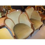 Pair of Edwardian mahogany and marquetry inlaid drawing room armchairs with shell form backs and