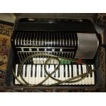 Hohner, Electravox piano accordion, in original fitted case with fitted pick-up and transformer