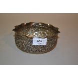 Small Burmese white metal bowl with floral decoration in relief