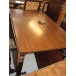 19th Century mahogany extending dining table with single extra leaf, raised on turned and reeded