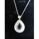 Sapphire and diamond set tear drop pendant with large centre stone