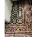 Modern blue ground Bokhara pattern machine made carpet, 2.8m x 2m