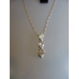 18ct White gold three stone, three colour graduated diamond pendant necklace