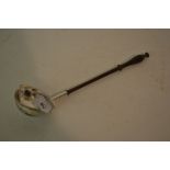 Antique white metal toddy ladle with double lipped bowl and turned fruitwood handle