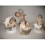 Royal Copenhagen figure of a kneeling faun with a parrot together with three similar smaller