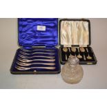 Cased set of six Sheffield silver cake forks and a cased set of six silver teaspoons together with